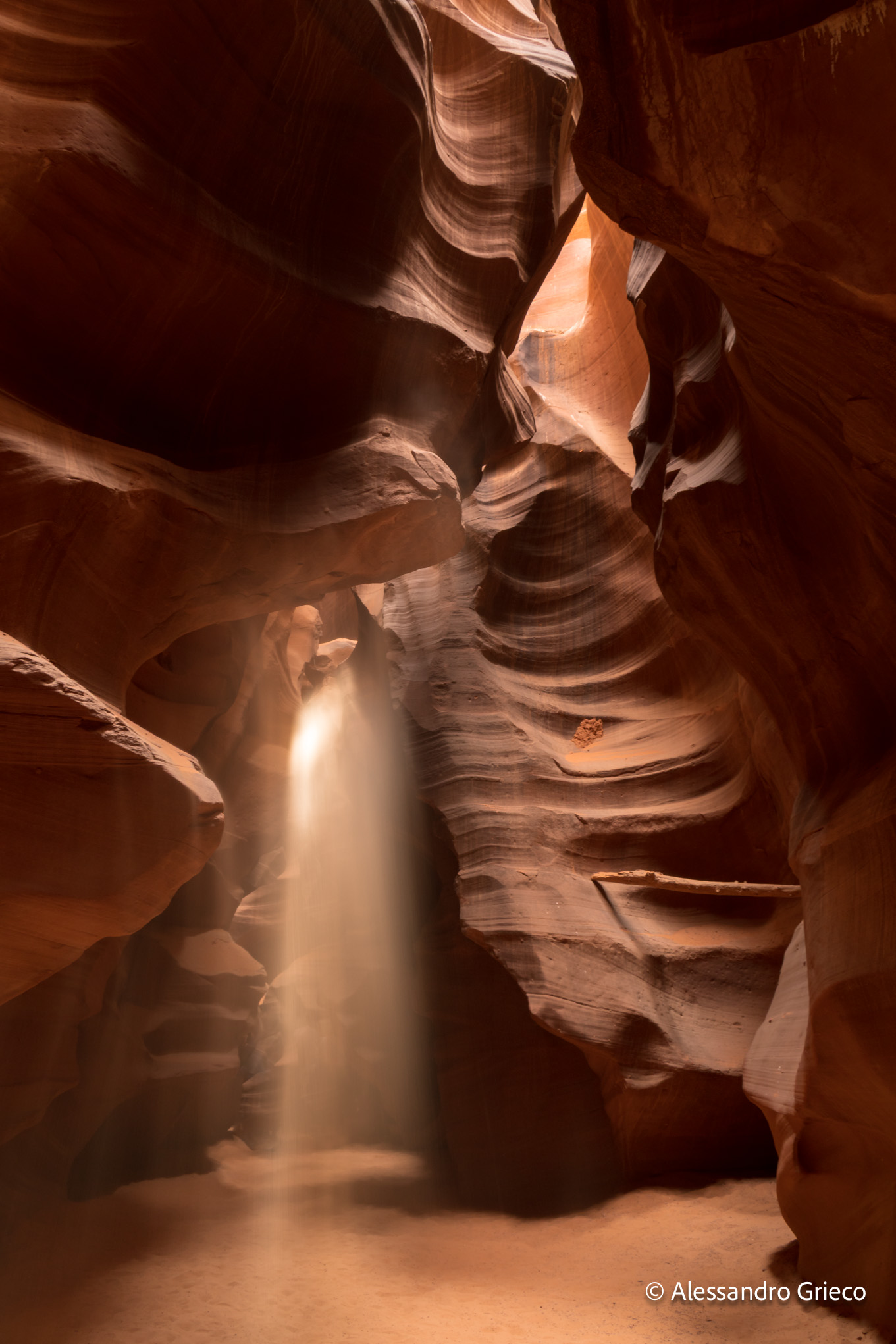 Antelope Canyon · a single beam of light finding the canyon floor